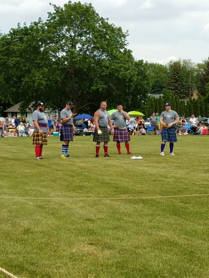Athletes in kilts